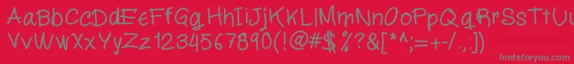 Miloscript Font – Gray Fonts on Red Background