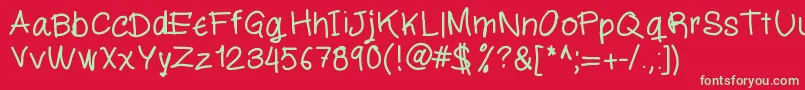 Fonte Miloscript – fontes verdes em um fundo vermelho