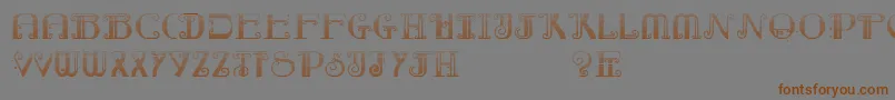 RebimbocaGradient-Schriftart – Braune Schriften auf grauem Hintergrund