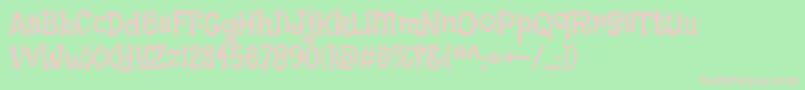 Czcionka FlavorsRegular – różowe czcionki na zielonym tle