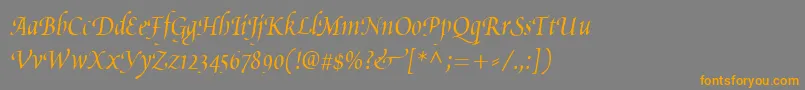 フォントPoeticaChanceryIii – オレンジの文字は灰色の背景にあります。