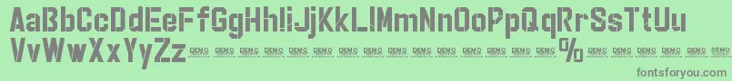 Шрифт StrikerEurekaCutPersonalUse – серые шрифты на зелёном фоне