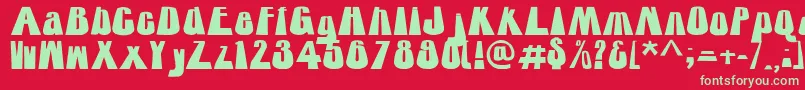 フォントTowering – 赤い背景に緑の文字