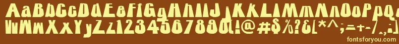 Towering Font – Yellow Fonts on Brown Background