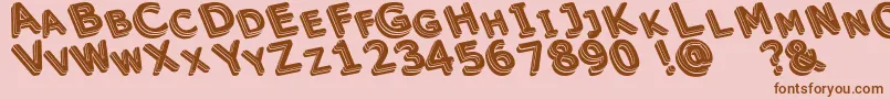 Unek Font – Brown Fonts on Pink Background