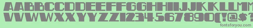 Indochinenf Font – Gray Fonts on Green Background