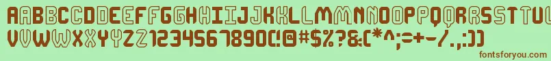 DhonjakoSt Font – Brown Fonts on Green Background