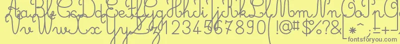 Gastondemo-Schriftart – Graue Schriften auf gelbem Hintergrund