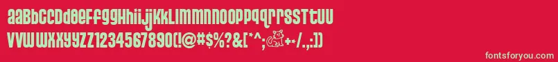 PussycatSnickers-Schriftart – Grüne Schriften auf rotem Hintergrund