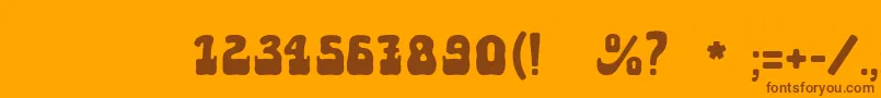 Aktau Font – Brown Fonts on Orange Background