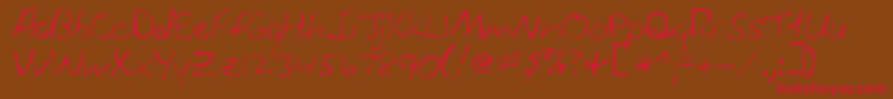 SueRegular Font – Red Fonts on Brown Background