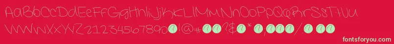 フォントInterconnecteddemoLight – 赤い背景に緑の文字