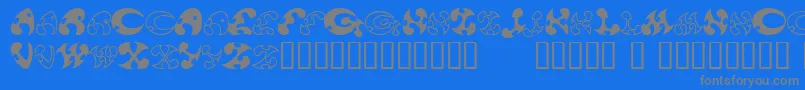 13DokusanNormal-fontti – harmaat kirjasimet sinisellä taustalla
