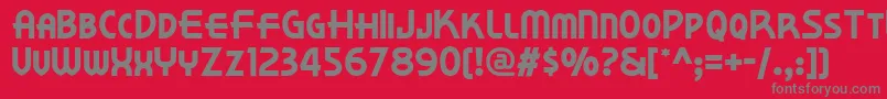 フォントKornerdelinf – 赤い背景に灰色の文字