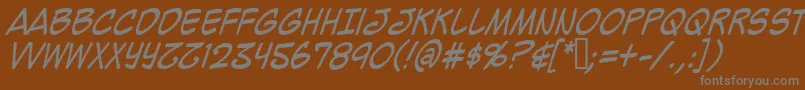 Mighzci-fontti – harmaat kirjasimet ruskealla taustalla