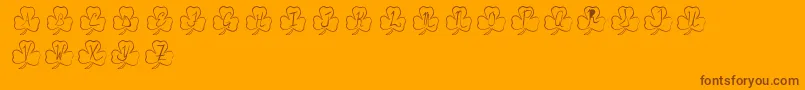 Weitere Informationen zur PotOfGold-Schriftart PotOfGold-Schriftart – Braune Schriften auf orangefarbenem Hintergrund