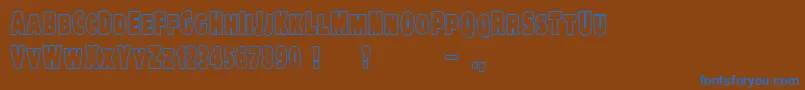 VtcKreepykomikatwoOutline Font – Blue Fonts on Brown Background