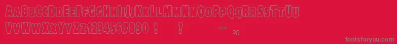 VtcKreepykomikatwoOutline-Schriftart – Graue Schriften auf rotem Hintergrund