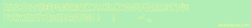 VtcKreepykomikatwoOutline Font – Yellow Fonts on Green Background