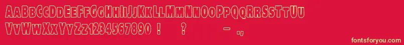 VtcKreepykomikatwoOutline Font – Yellow Fonts on Red Background