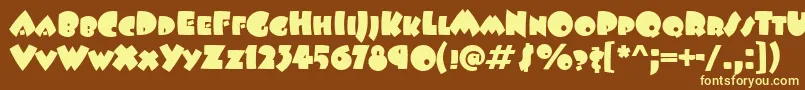BeeskneesScItcTt-fontti – keltaiset fontit ruskealla taustalla