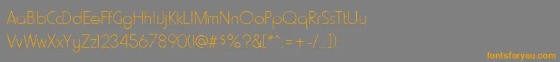 フォントHowardthinRegular – オレンジの文字は灰色の背景にあります。