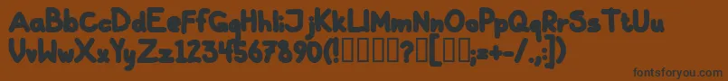 GallaBlack-Schriftart – Schwarze Schriften auf braunem Hintergrund