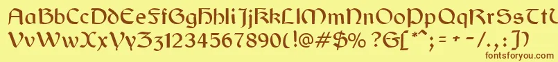 フォントGaelic – 茶色の文字が黄色の背景にあります。