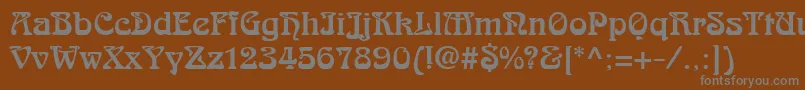 フォントArabikdbNormal – 茶色の背景に灰色の文字