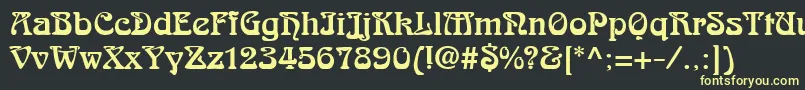 フォントArabikdbNormal – 黒い背景に黄色の文字