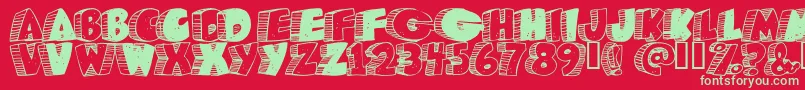 Caveman Font – Green Fonts on Red Background