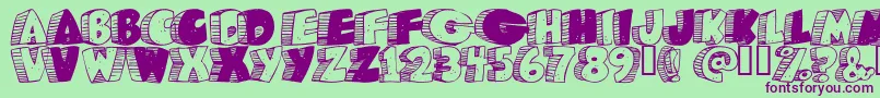 Caveman Font – Purple Fonts on Green Background