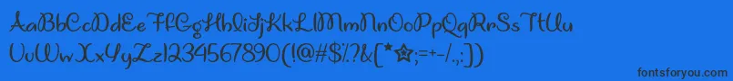 UnicornGigglesOtf Font – Black Fonts on Blue Background