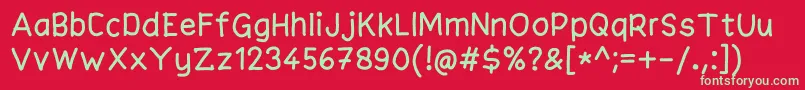 Adhie Font – Green Fonts on Red Background