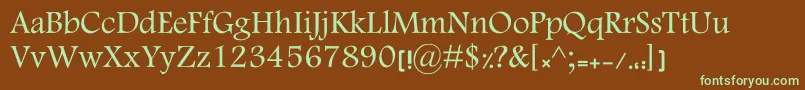 フォントMotkenKElham – 緑色の文字が茶色の背景にあります。