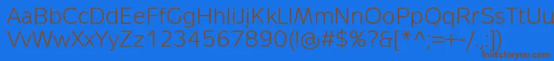 MetronLightPro-Schriftart – Braune Schriften auf blauem Hintergrund