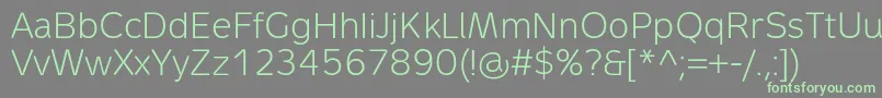 MetronLightPro-fontti – vihreät fontit harmaalla taustalla