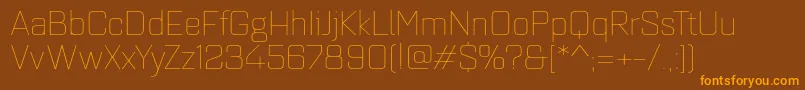 Quarcaextthin Font – Orange Fonts on Brown Background
