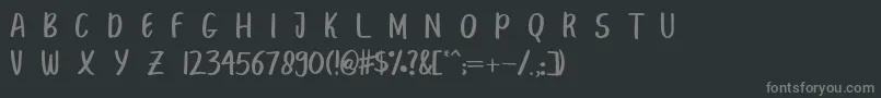 Шрифт BreakBeachPersonalUse – серые шрифты на чёрном фоне