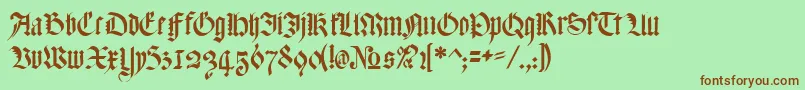 Fonte MeyneTextur – fontes marrons em um fundo verde