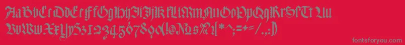 Fonte MeyneTextur – fontes cinzas em um fundo vermelho