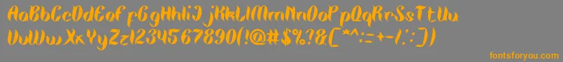 TheMiracle Font – Orange Fonts on Gray Background