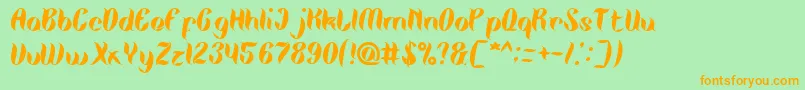 TheMiracle Font – Orange Fonts on Green Background