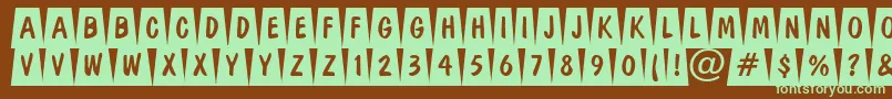 DominottlcmdvbkRegular Font – Green Fonts on Brown Background