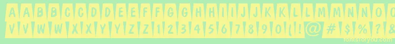 DominottlcmdvbkRegular Font – Yellow Fonts on Green Background