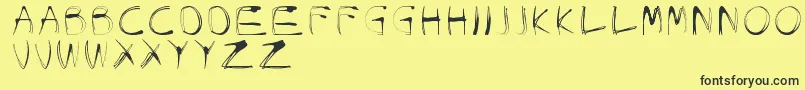 GlowCarroDanishSpiik Font – Black Fonts on Yellow Background