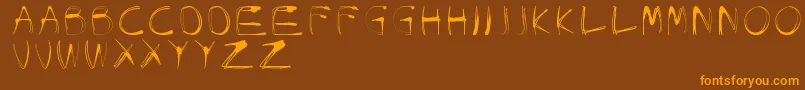 GlowCarroDanishSpiik-Schriftart – Orangefarbene Schriften auf braunem Hintergrund