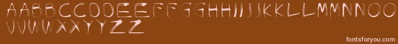 フォントGlowCarroDanishSpiik – 茶色の背景にピンクのフォント