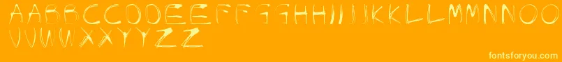 フォントGlowCarroDanishSpiik – オレンジの背景に黄色の文字