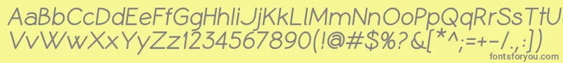CoameiBi-fontti – harmaat kirjasimet keltaisella taustalla